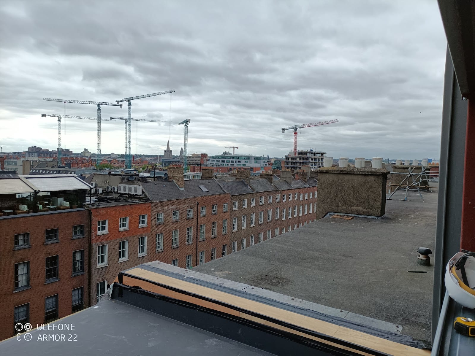 Dublin commercial construction project skyline with tower cranes and modern developments