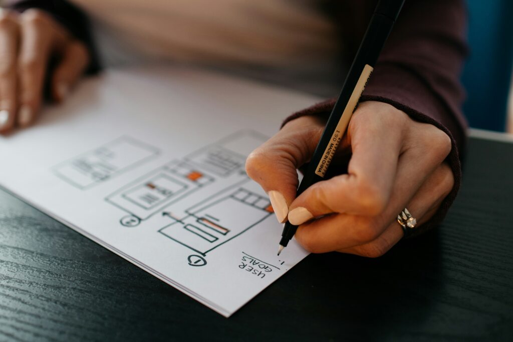 Commercial contracts and architectural blueprints on conference table